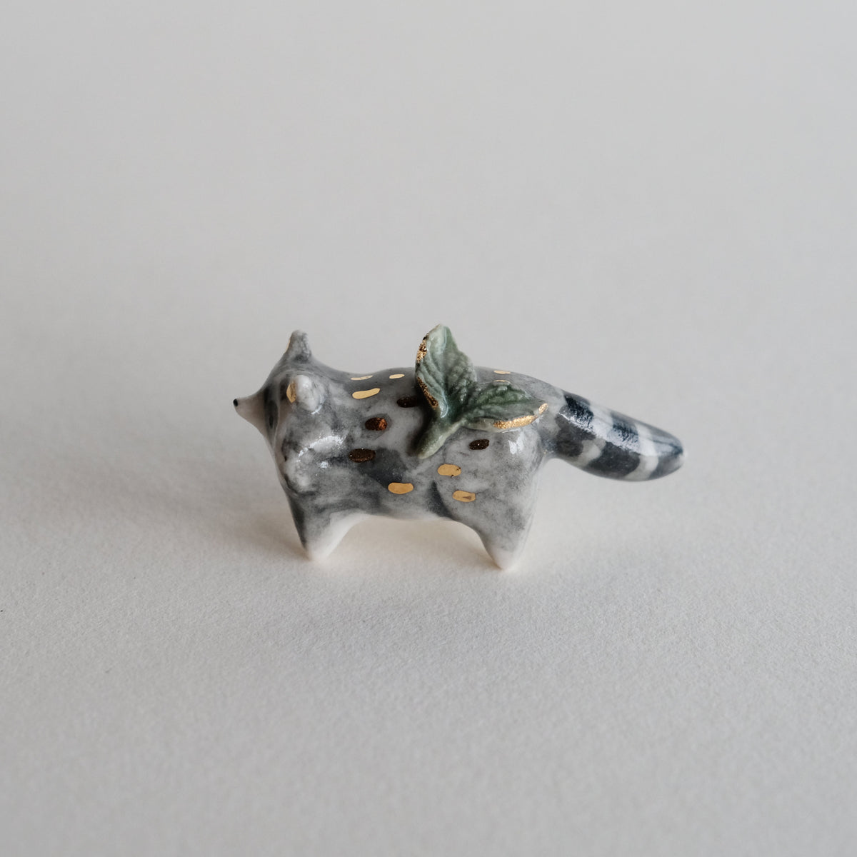 Raccoon and Sprout Guardian – Lithops Studio