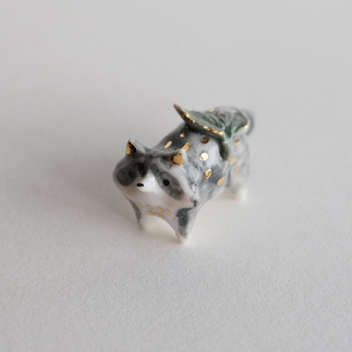 Raccoon and Sprout Guardian – Lithops Studio